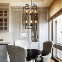 Oxwell Geometric Pendant Chandelier – lantern-style cage pendant lamp illuminated in dining room setting