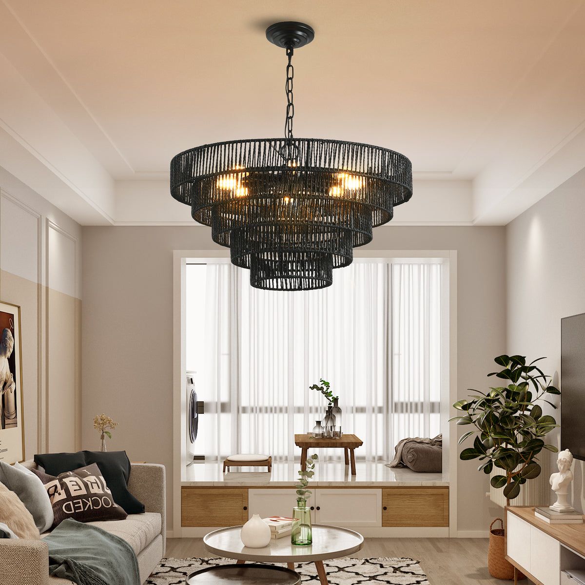 24" black woven hemp rope 5-tier chandelier hanging above a living room seating area, boho pendant light fixture