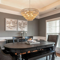 Woven hemp rope 5-layer chandelier hanging above a black dining table set, elegant boho hanging light fixture