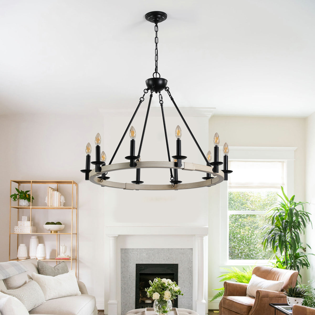 The Ashcombe Round Candle Chandelier suspended in a cozy living room, highlighting its classic candle-style bulb arrangement and elegant farmhouse design.
